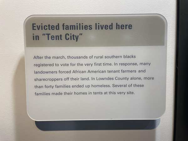 Selma to Montgomery exhibit panel: Evicted families lived here in Tent City, describing retaliation against Black voters