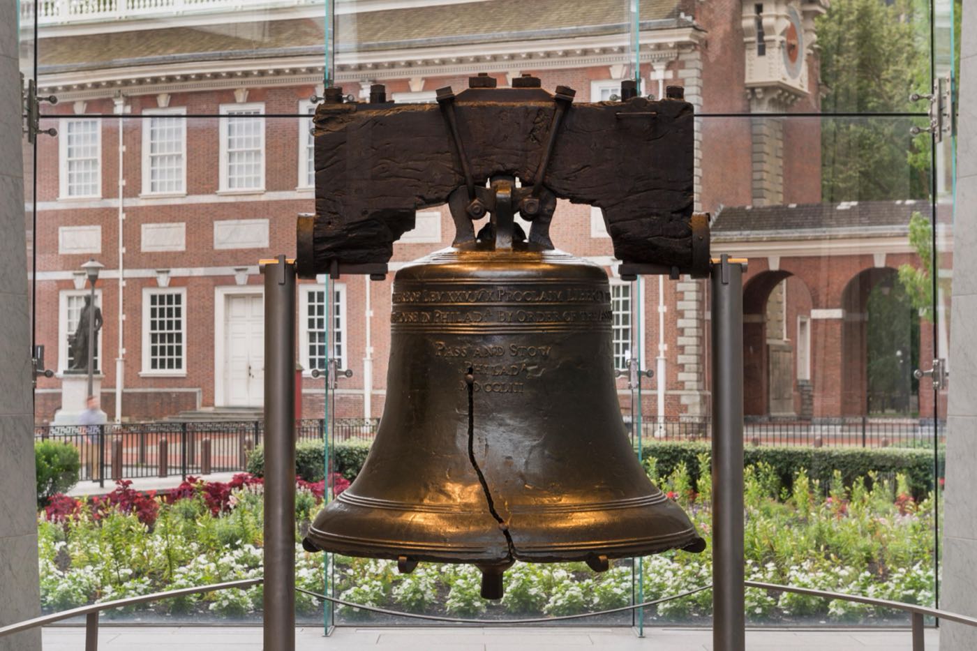 The Liberty Bell, with Independence Hall behind it
