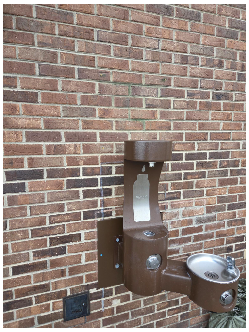 After: Empty location where Bottle Filling Station sign was removed