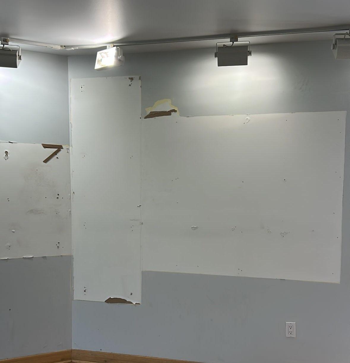 Interior walls of Gateway NRA visitor center after exhibit panels stripped from walls
