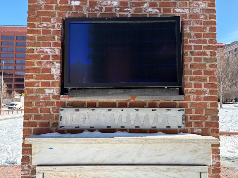 "Washington's Death and a Renewed Hope for Freedom" (plaque next to a TV monitor) — after