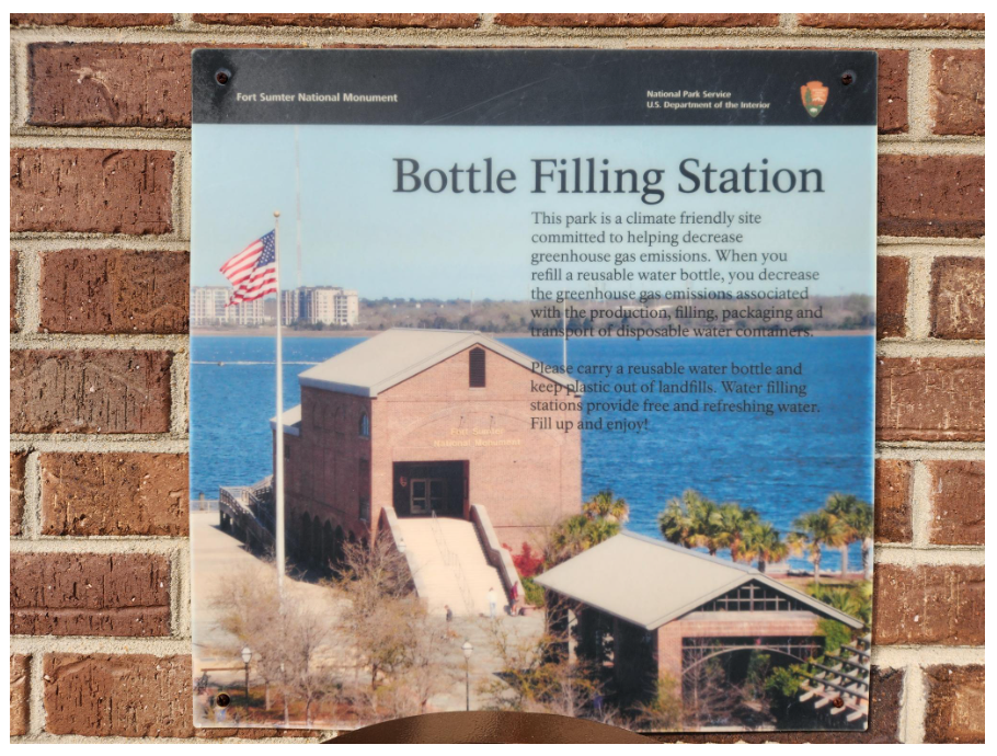 Before: Fort Sumter Bottle Filling Station interpretive sign about reducing greenhouse gas emissions